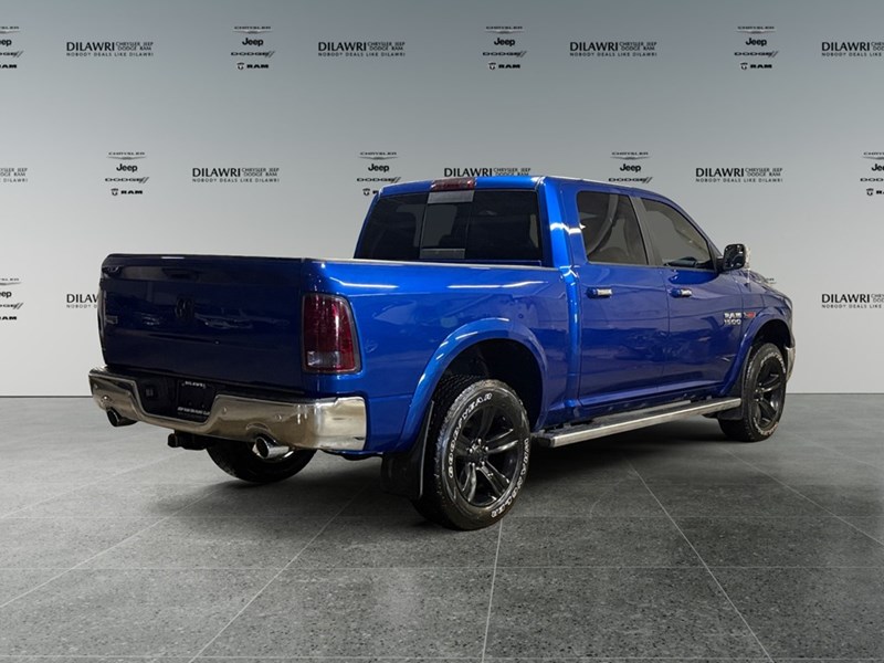 2016 RAM 1500 4WD Crew Cab 140.5" Laramie