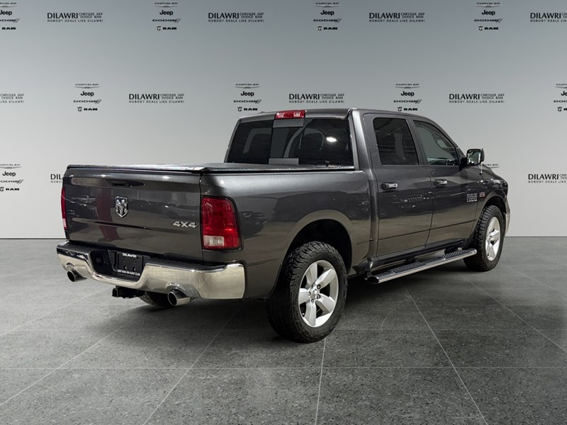 2016 RAM 1500 4WD Crew Cab 140.5" SLT