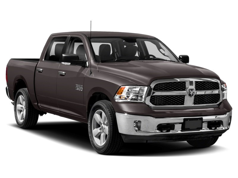 2016 RAM 1500 4WD Crew Cab 140.5" SLT Exterior Shot 9
